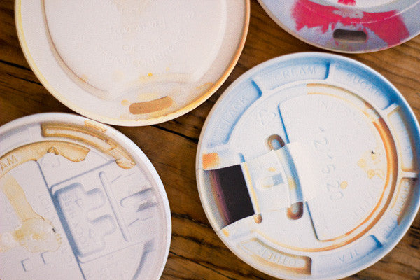 Designer coffee lid coasters by Jennifer Daniels